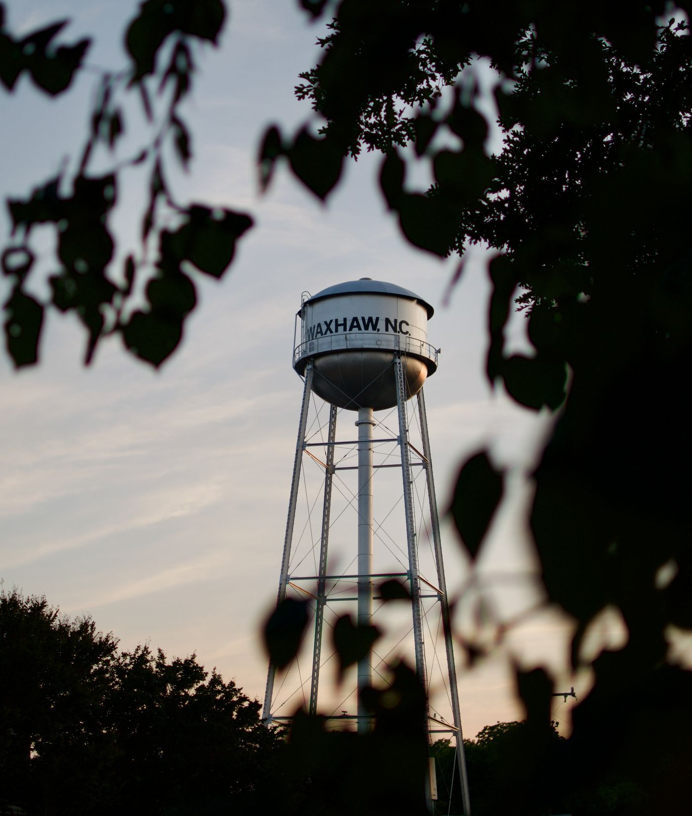 The Waxhaw, North Carolina water tower at dusk, photographed by Mike Loerop